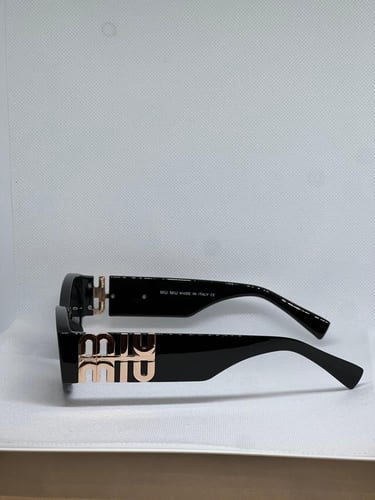 نظارة MIU MIU