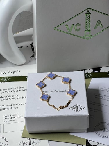 إسوارة Van cleef ذهبي -فيروزي مميز