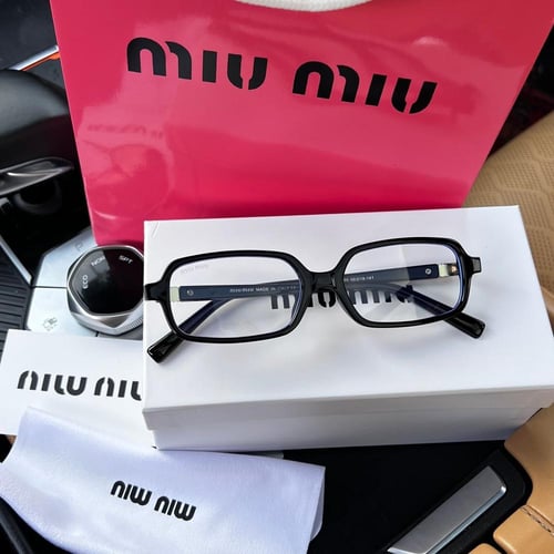 نظارة miu miu أطار أسود - عدسة شفافة
