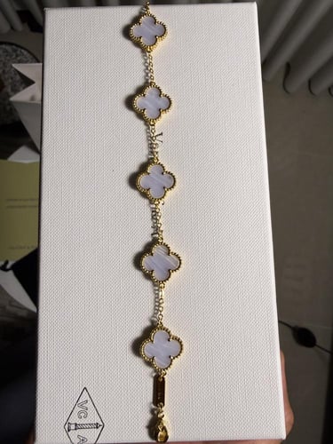 إسوارة Van cleef ذهبي - فيروزي مخطط