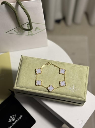 إسوارة Van cleef ذهبي - فيروزي مخطط