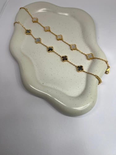 أسوارة Van cleef ذهبي وردة