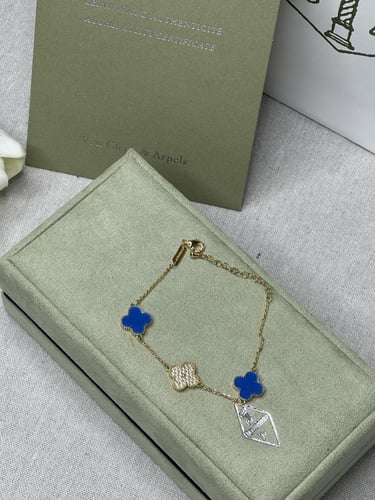 إسوارة Van cleef ذهبي -ملون ( بدون الملحقات )