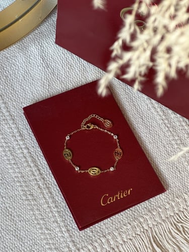 إسوارة Cartier معدن ذهبي بفصوص