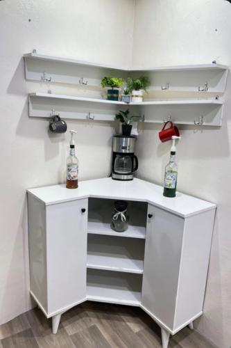 Corner coffee corner with shelves
