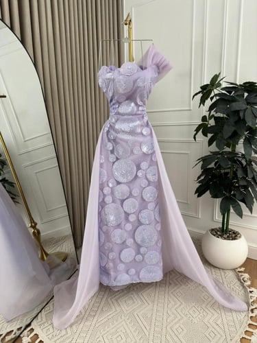 فستان تفته استرتش مبطن يكلفه مع ذيل اورجنزا