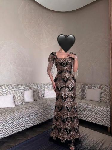 فستان تُل مع كرستال وخرز وبطانه تفته وهدب