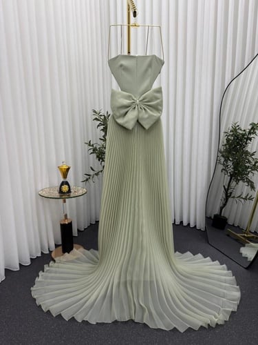 فستان كلفه مع ذيل اورجنزا تكسيرات