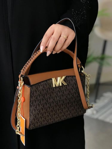 حقيبة مايكل كورس الأنيقة - لمسة فاخرة لإطلالة متكا...
