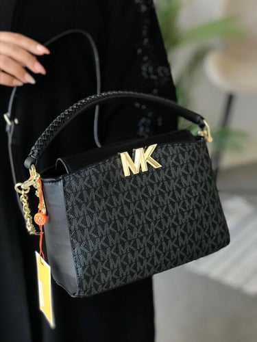 حقيبة مايكل كورس السوداء - لمسة فاخرة لكل إطلالة