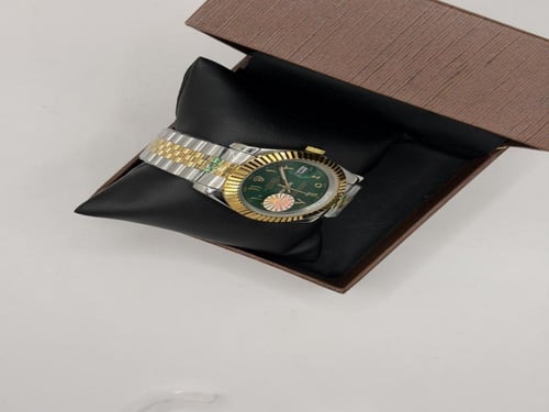 ساعة رولكس اخضر