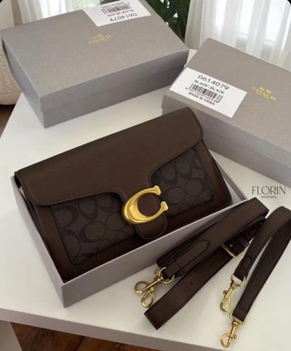 شنطة كوتش بني محمر