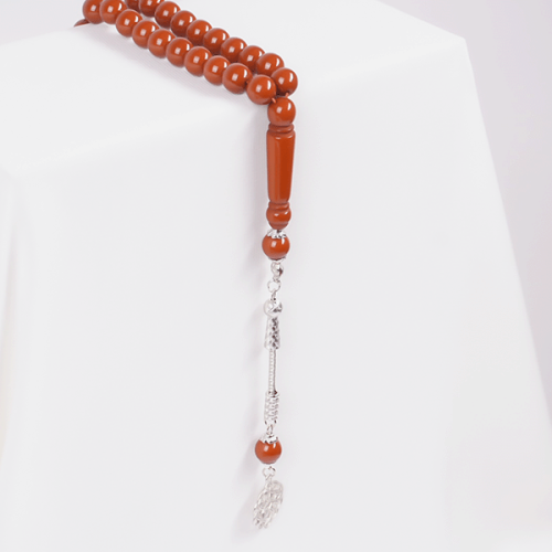 A brown prayer bead strand