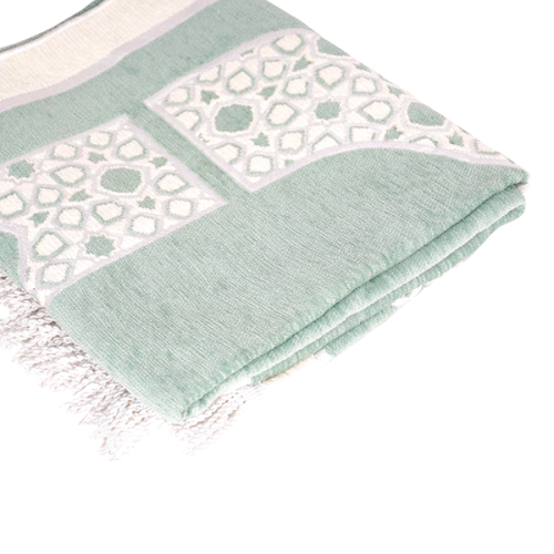 Green prayer rug