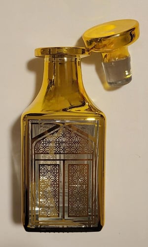 زجاج عرض وحفظ دهن العود والعطور والزيوت العطرية