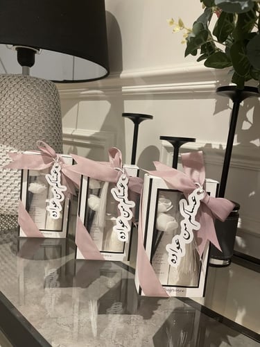 مجموعة توزيعات فواحات بعبارة عيد سعيد