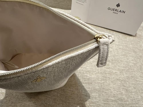 عناية مع محفظة من جيرلان (اصلي)