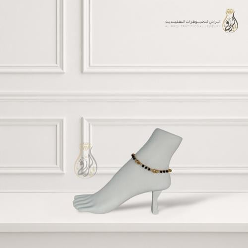 خلخال الأحجار السوداء والذهبية