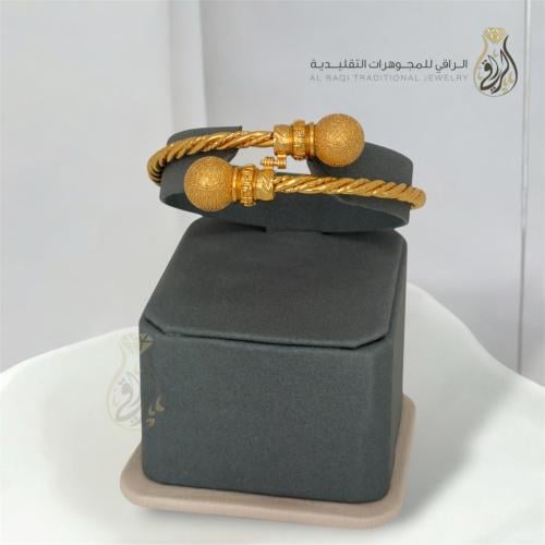 أسوارة حبلية ذهبية بنهايات كروية فاخرة
