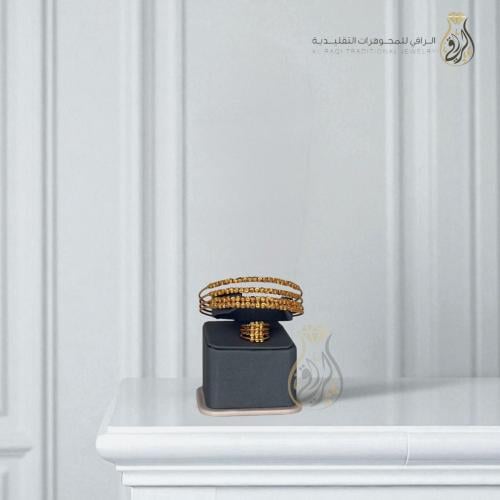 أسوارة وخاتم متعدد الطبقات بتصميم كروي