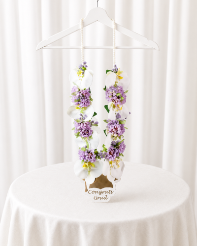 Graduation necklace with purple artificial flower