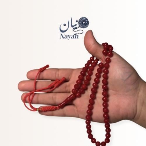 Red round Nawaem beaded prayer bead bracelet with a tassel