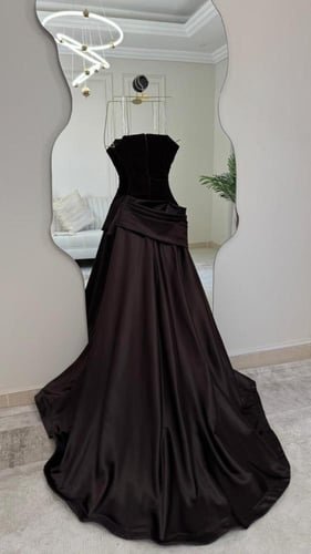 فستان سهرة فاخر بقصة حورية البحر ولون الشوكولاتة ا...