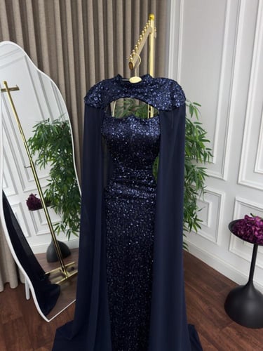 فستان سهرة كحلي مرصع مع كاب شيفون فاخر