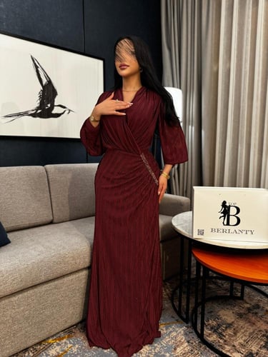 فستان "سهرة ملكي" بكسرات البليسيه ولون البرغندي ال...