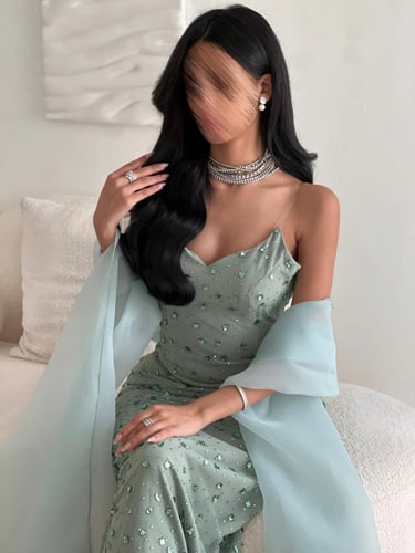 فستان سهرة سماوي مطرز أناقة ملكية بتفاصيل براقة