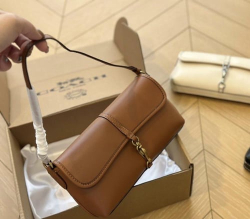 شنطة كتف كوتش