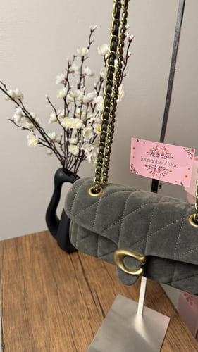 شنطة كوتش مخمل زيتي صغير