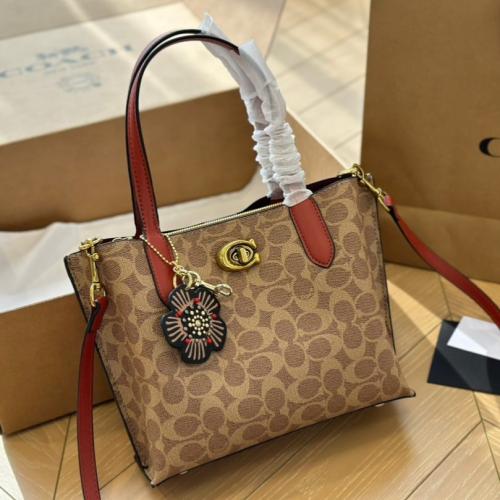 شنطة يد كوتش