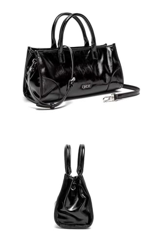 شنطة يد سي اتش جلد أسود