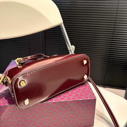 شنطة يد توري بورش مطفي