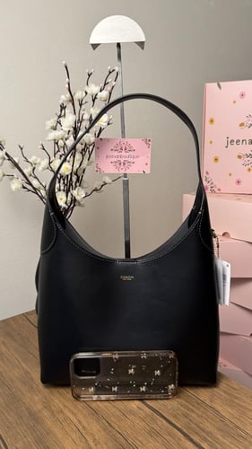 شنطة كتف كوتش بروكلين مديم