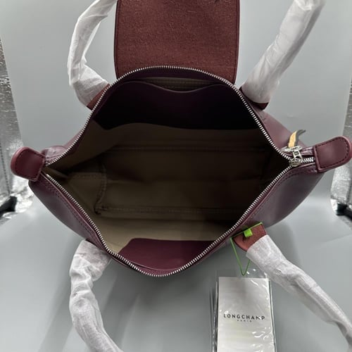 شنطة لونج شامب جلد عنابي