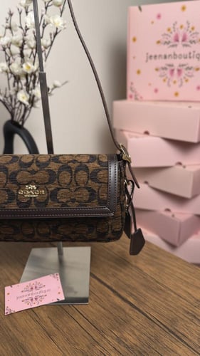 شنطة كتف كوتش بني