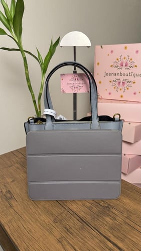 شنطة يد كوتش