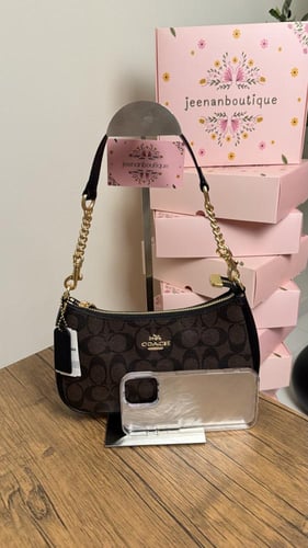 شنطة كتف كوتش بني