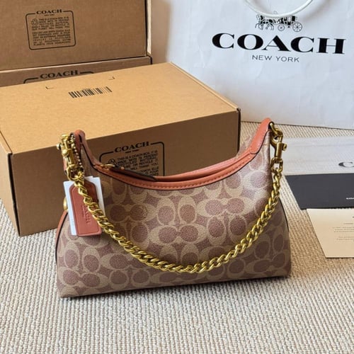 شنطة يد كوتش