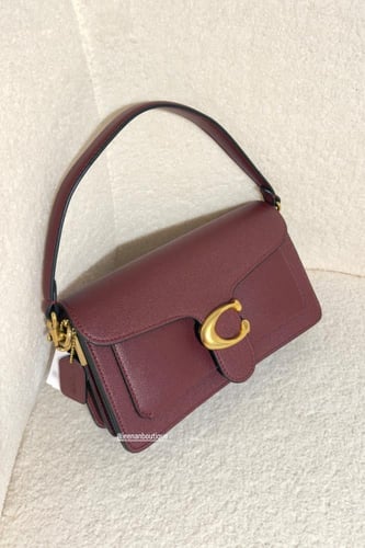 شنطة كوتش تابي عنابي