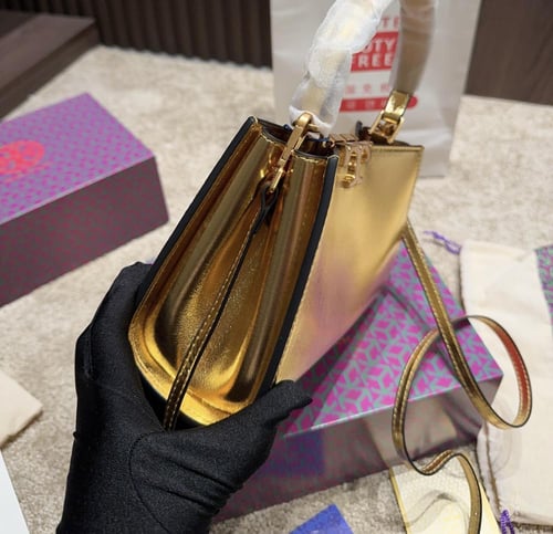 شنطة يد توري بورش ميني ذهبي