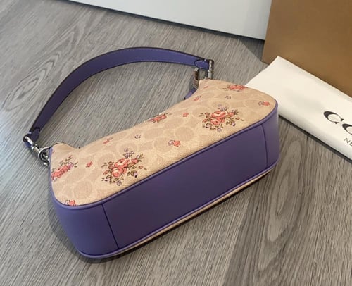 شنطة يد كوتش