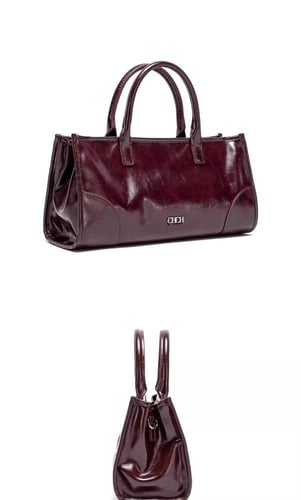 شنطة يد سي اتش جلد عنابي