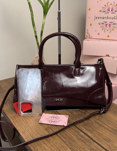 شنطة يد سي اتش جلد عنابي