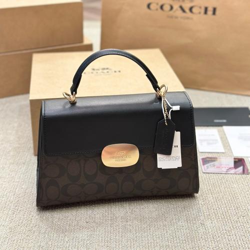 شنطة يد كوتش بني