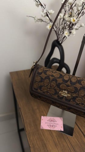 شنطة كتف كوتش بني