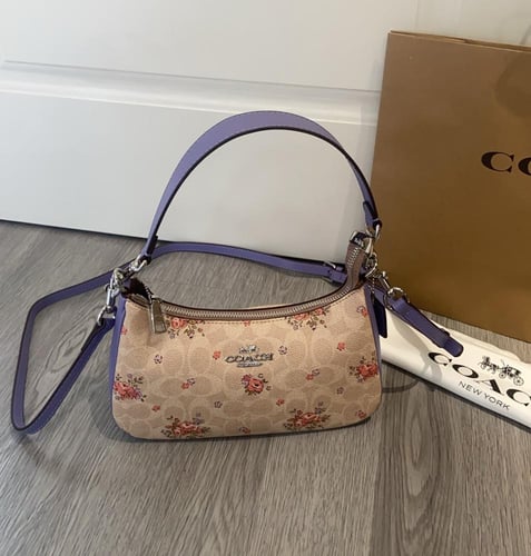 شنطة يد كوتش