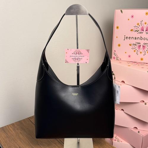 شنطة كتف كوتش بروكلين مديم